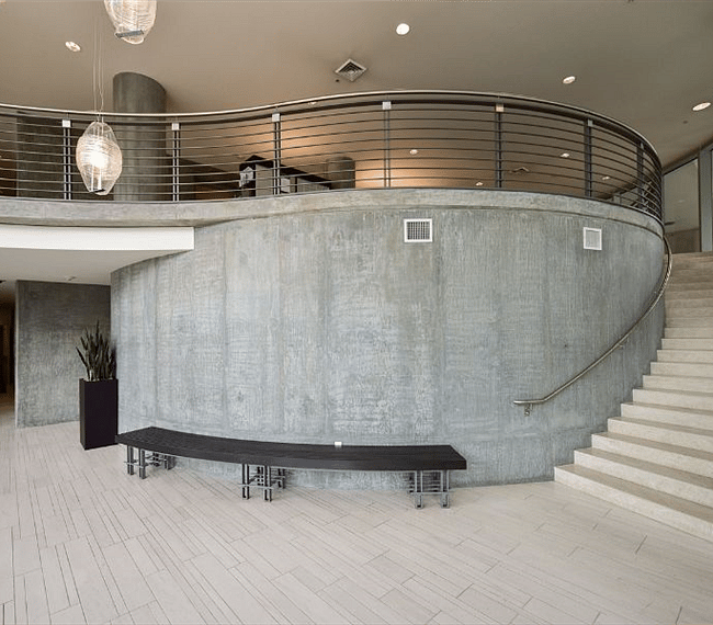 The curved stair will take you up to the balcony level of the lobby.