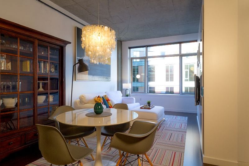 Over 10 foot tall ceilings give an expansive feel to the open Kitchen-Dining-Living spaces.