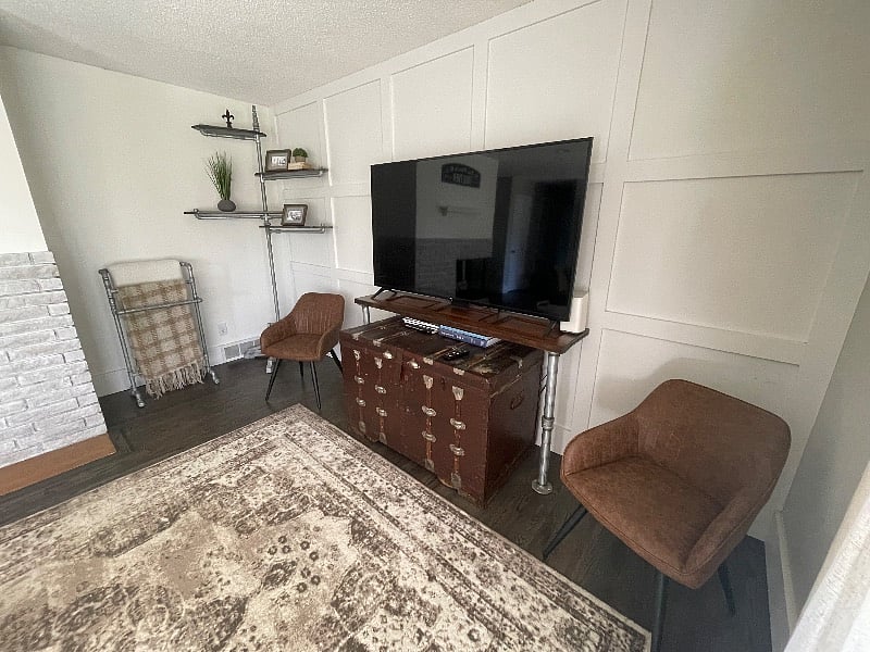 Living room with 72" smart TV