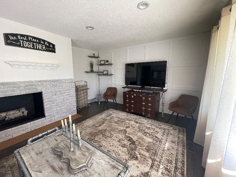 Living room with 72" smart TV