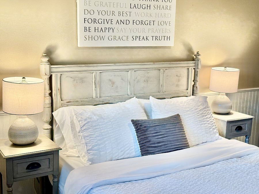 Second bedroom with queen bed and designated work space.