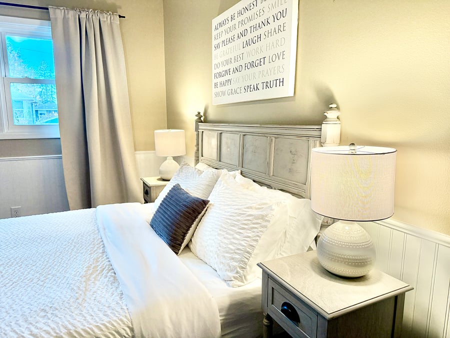 Second bedroom with queen bed and designated work space.