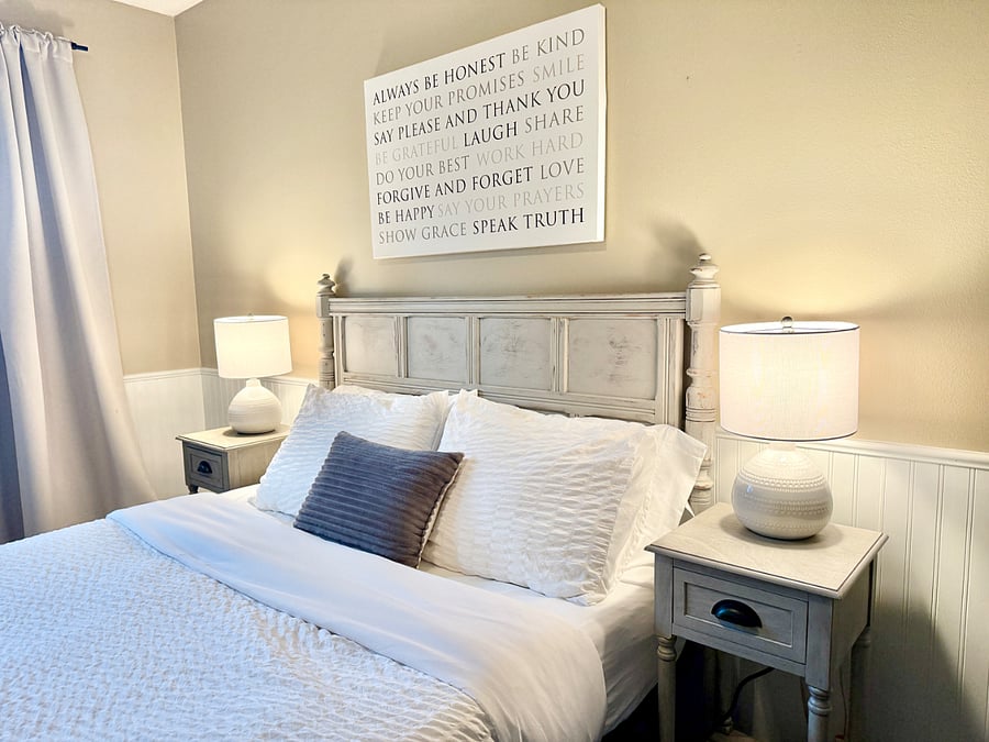 Second bedroom with queen bed and designated work space.