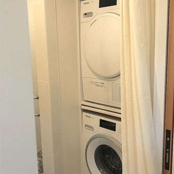 Stacked washer and dryer.