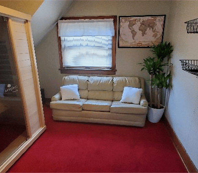Sauna room with Sunlighten Amplify 3. An infrared sauna that gets as hot as a traditional sauna (167 F). You would never imagine you could sweat so much! I love it for boosting my mood, energy, and general health. Maybe you will too.