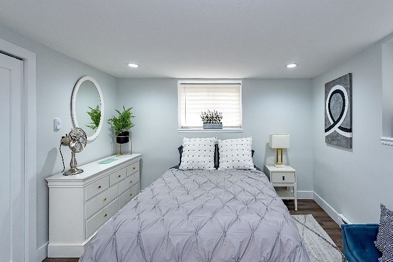 Queen sized bed with plenty of storage.