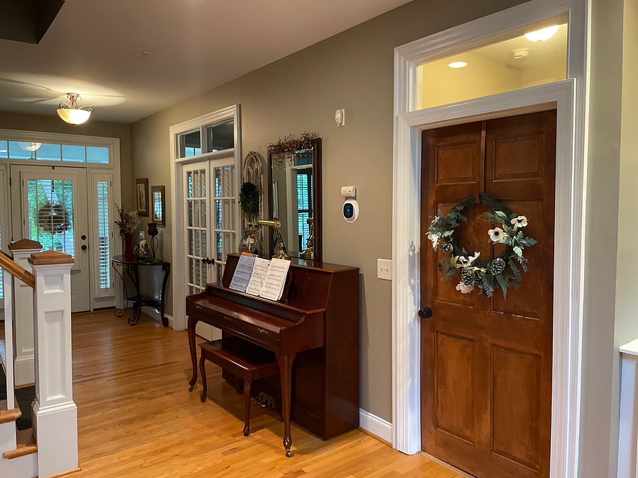 Door to suite with flower wreath, first floor close to entrance