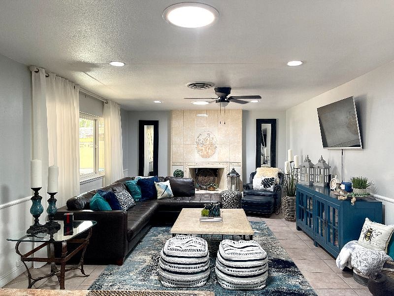 Family room with fireplace. Very comfortable space.
