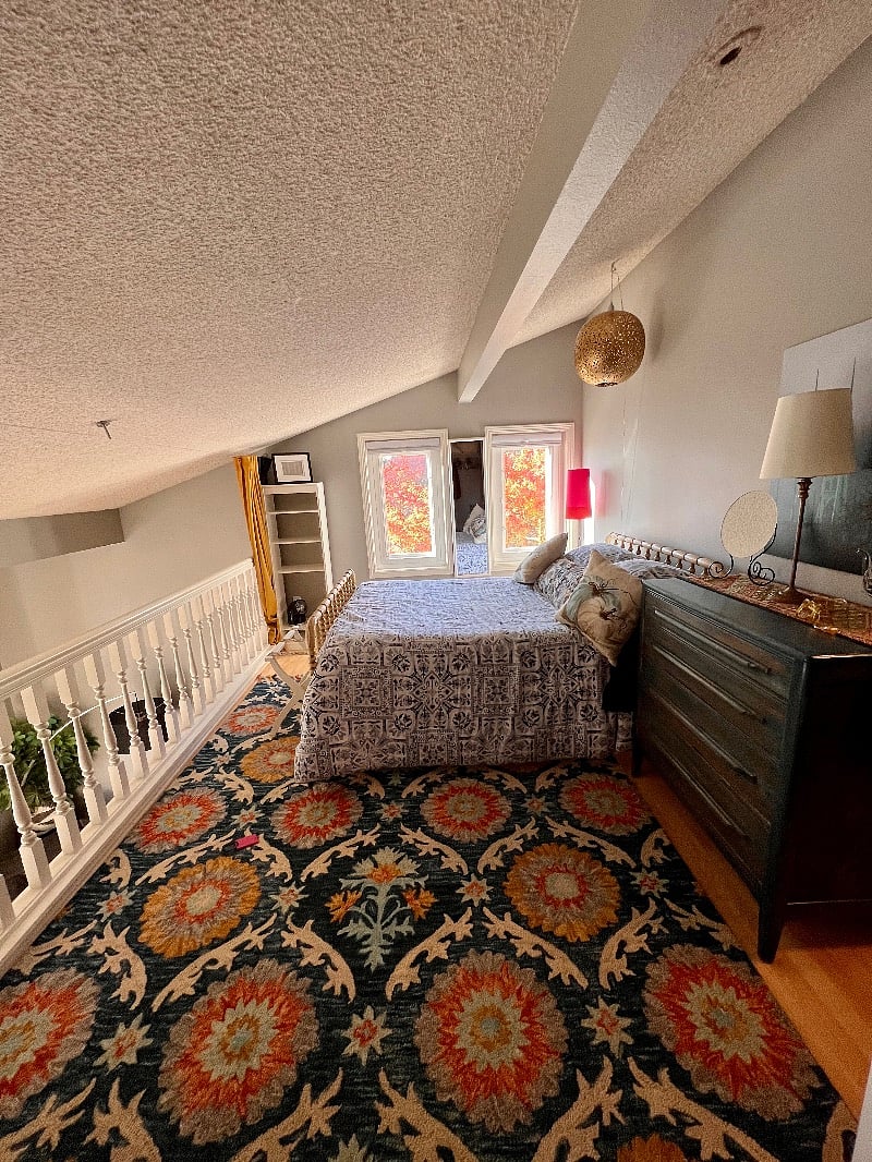 Bright lighted Loft bedroom (double bed) with office desk and chair, dresser, closet and bathroom. Curtains for privacy.