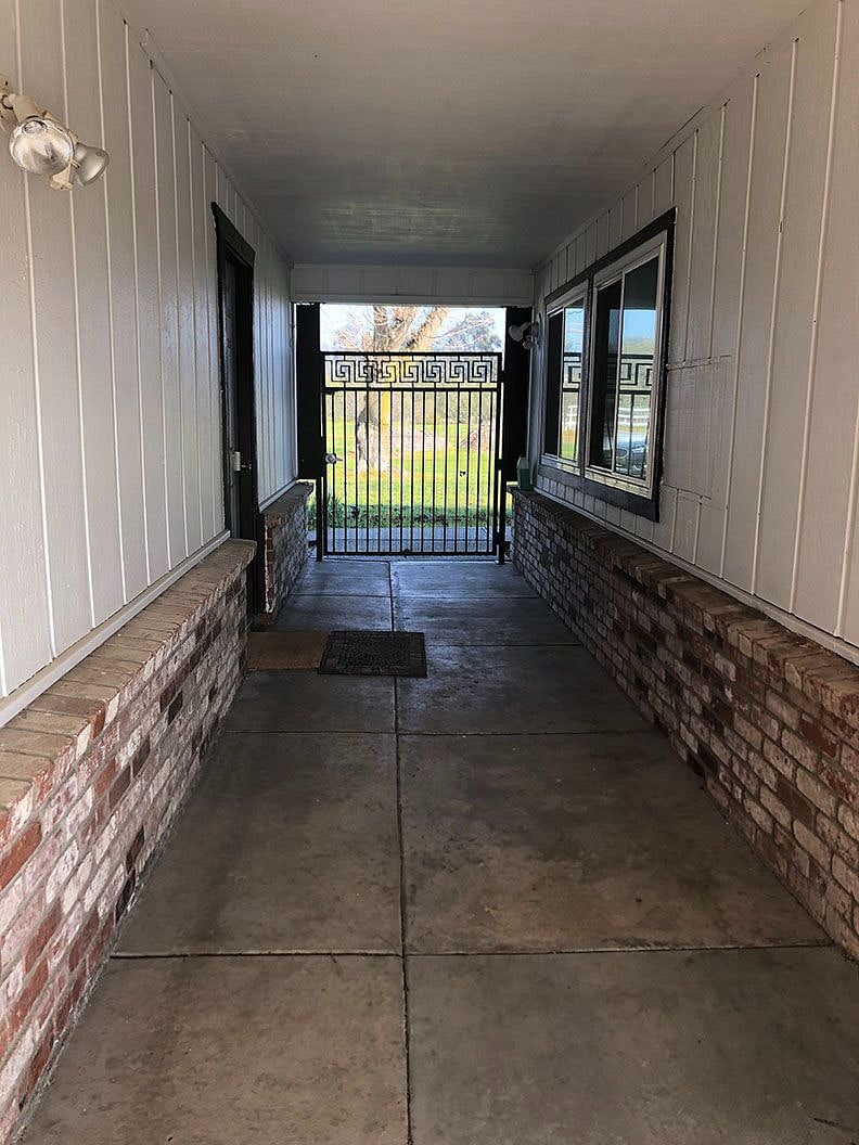 hallway to your door from back yard view