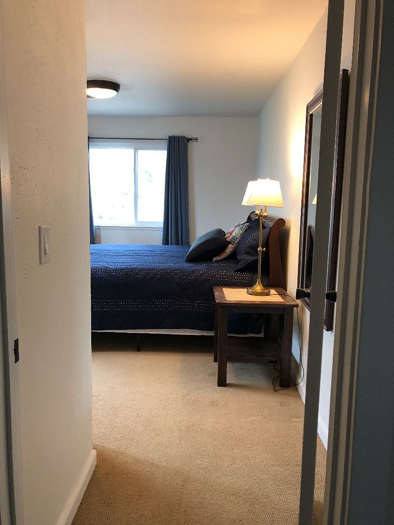 Bathroom to the left of this door