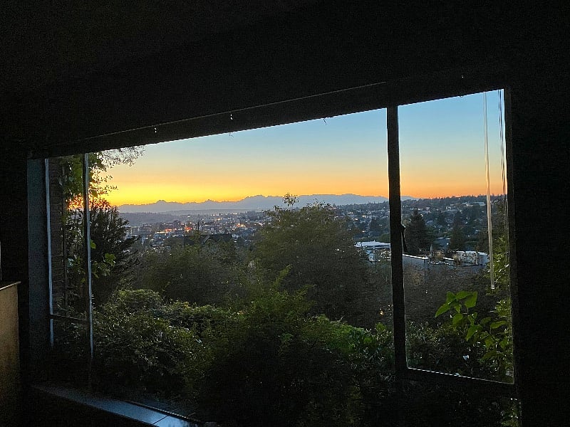 View from living room - October sunset with Olympics Mountains in the distance.