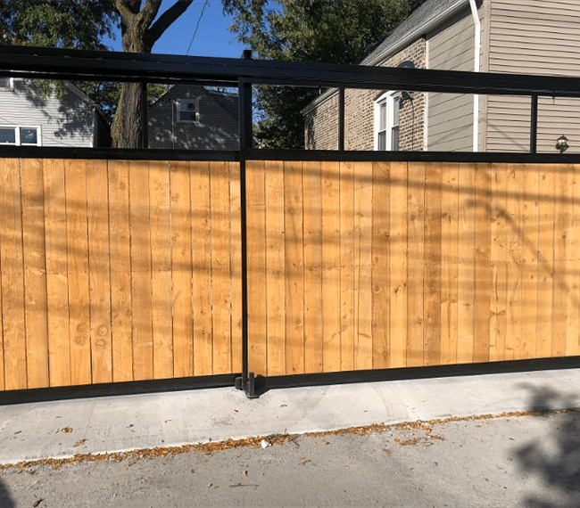 Gated back fence to backyard.