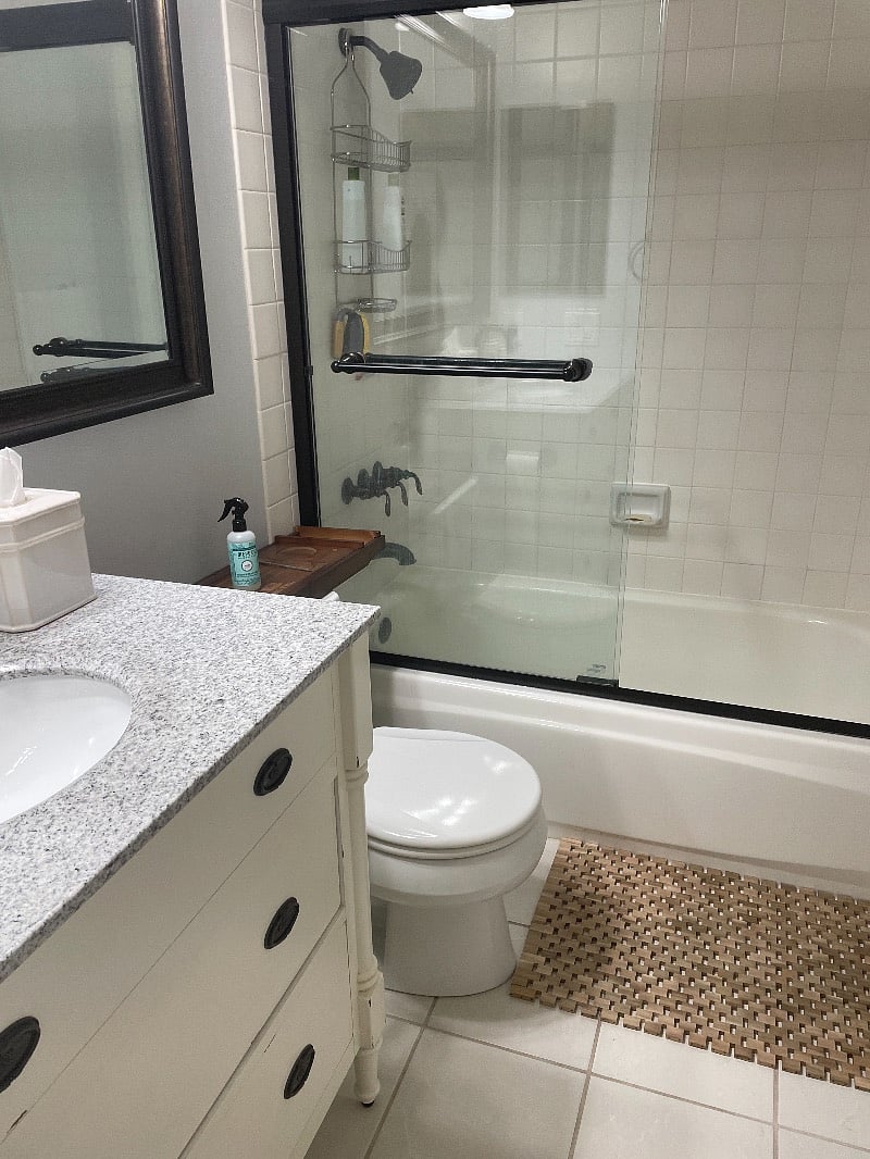 full bathroom with a tub