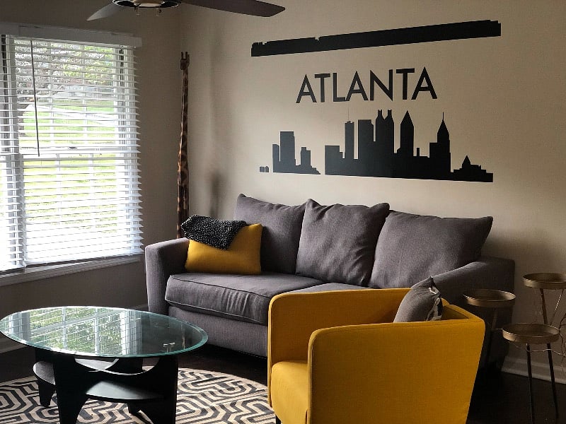 Please note: The home was repainted and that Atlanta picture is no longer on the wall.