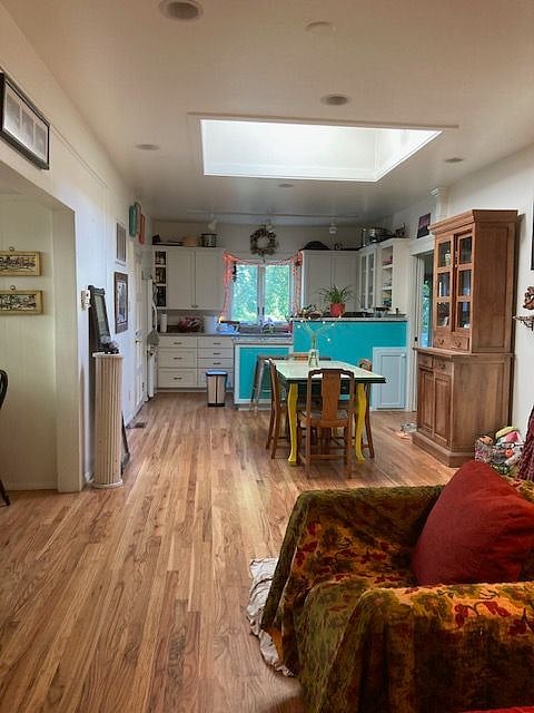 Dining room and kitchen with skylight for extra sunshine!