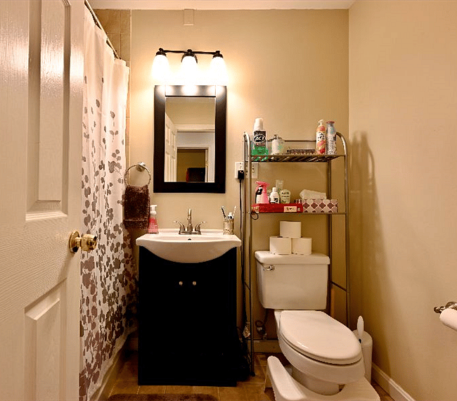 Bathroom with soap, shampoo, conditioner, hair dryer