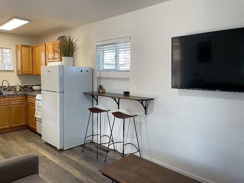 Living area is contemporary and spacious.