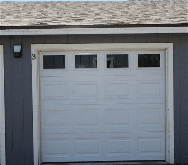 Single car garage: on property but not attached to house.