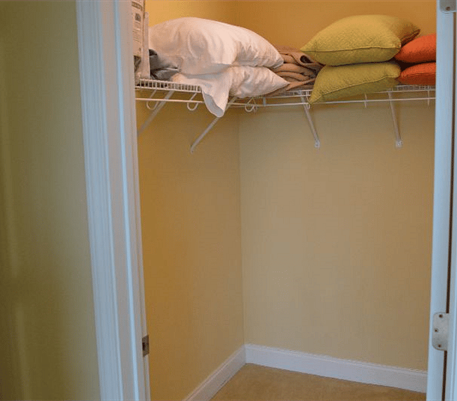 Master closet, includes extra pillows, blankets, hangers and vacuum.