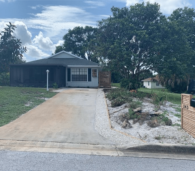 large driveway with enough room to park two vechicles. 