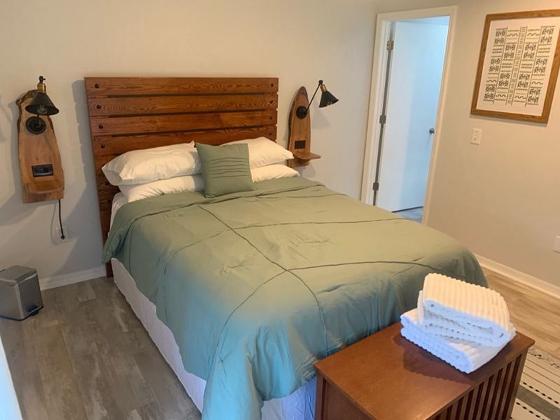 Recover from a day's hard work in the master bedroom surrounded by custom made furinture. 
(Queen bed)
