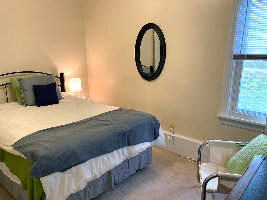 Primary bedroom with full size bed