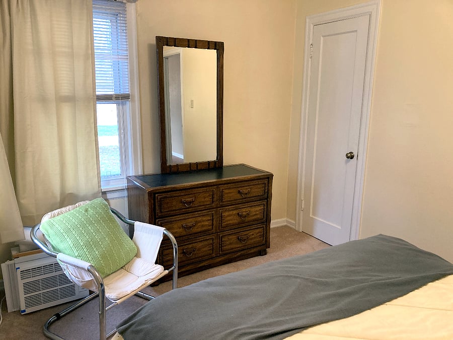 Primary bedroom with full size bed