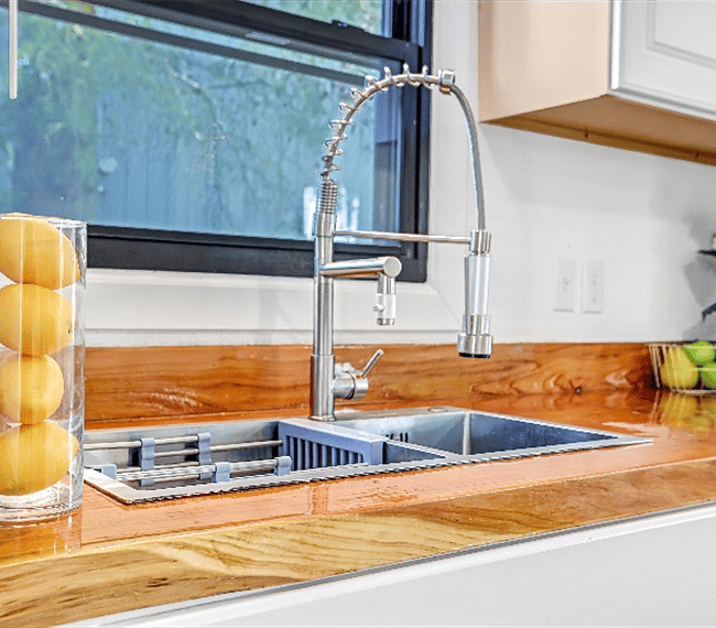 Lovely butcher countertops featured in the kitchen.