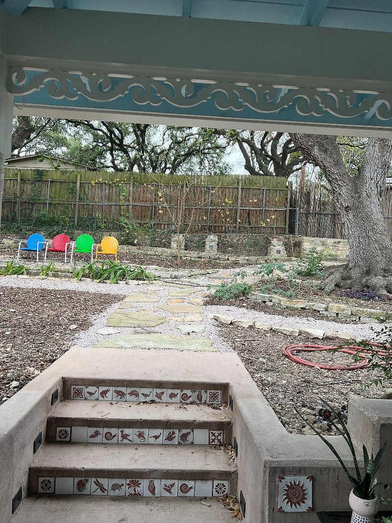 Backyard. We set up table and have special dinners outside for 10.