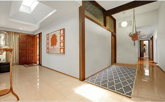 Spacious entry hall to common areas of home. Common areas are professionally cleaned every other week.