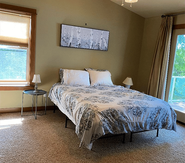 Main bedroom with balcony access