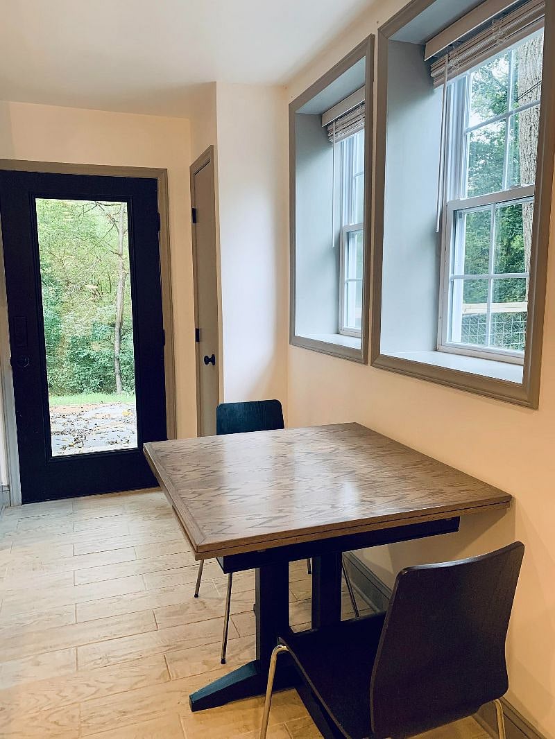 Expandable kitchen table in airy eat-in kitchen