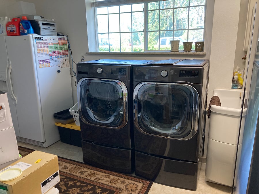 New LG washer and dryer in common laundry room area