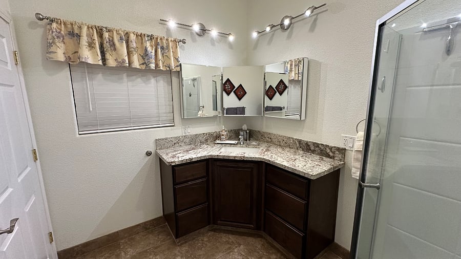 Three - mirrored front and back medicine cabinets for all viewing angles.