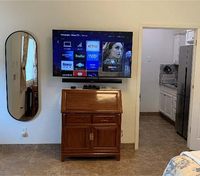 55 inch flat panel wall mounted TV/Monitor Local and streaming channels.