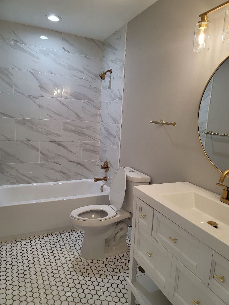 Room 2 bathroom with gold tone fixtures
Larger space, $1450 for this room.