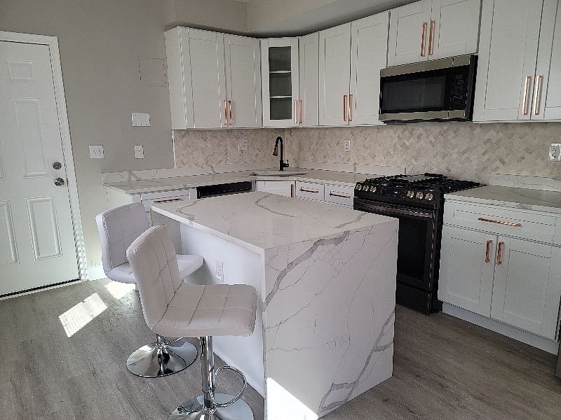 Vegan leather seating full kitchen and island