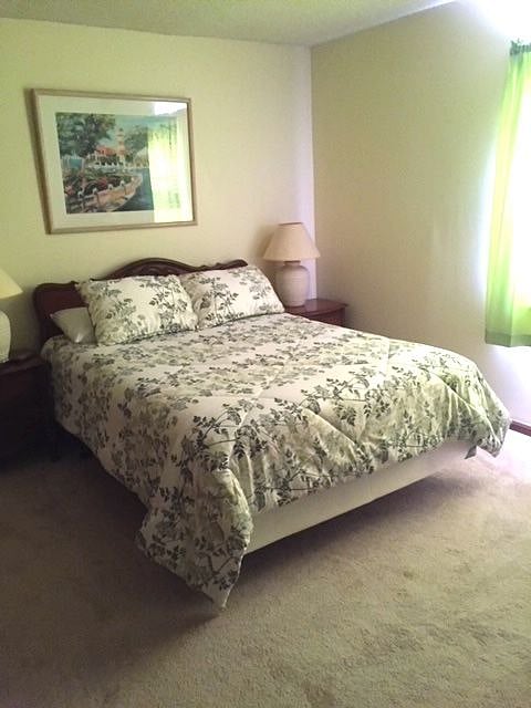 Queen bed in master bedroom