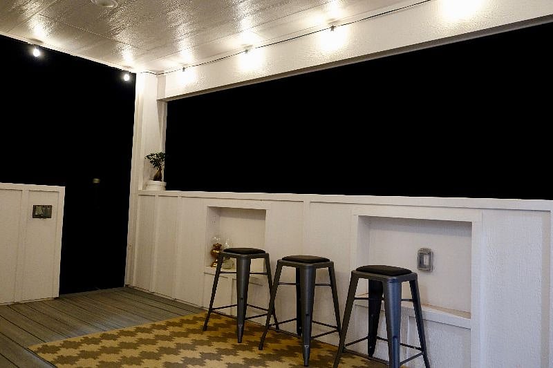 Deck at night with bistro lighting 