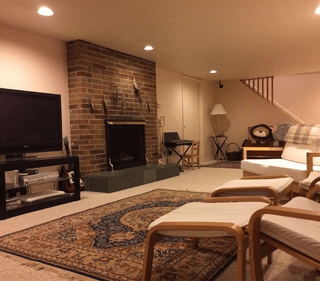 Suite living space - upstairs lead to the main floor