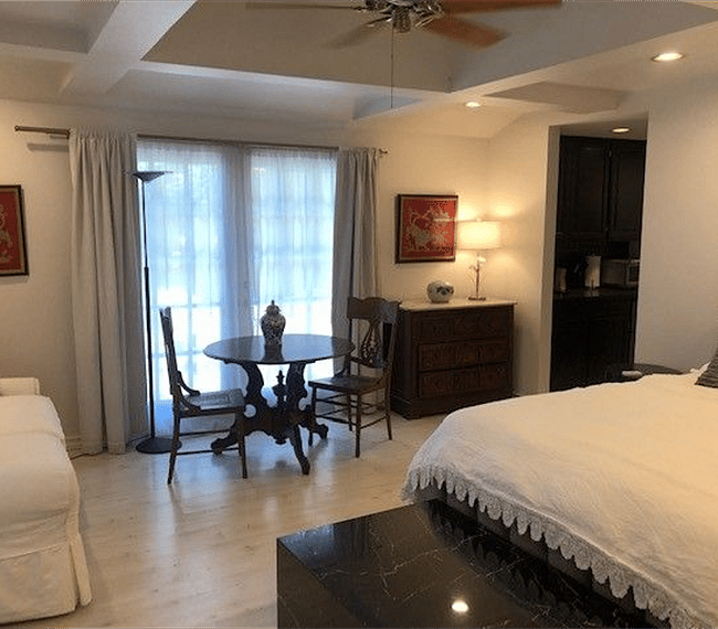 Bed, dining table and couch
