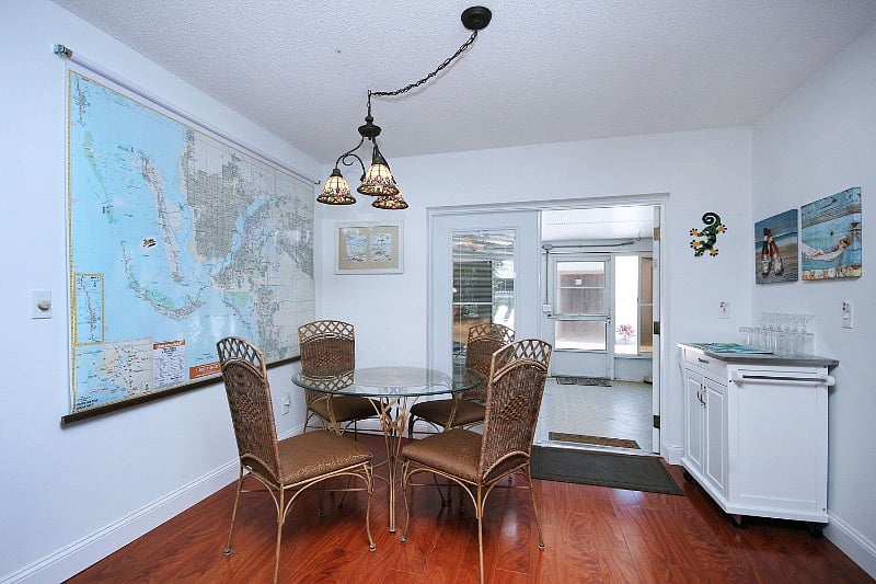 Dining area next to kitchen leads out to lanai