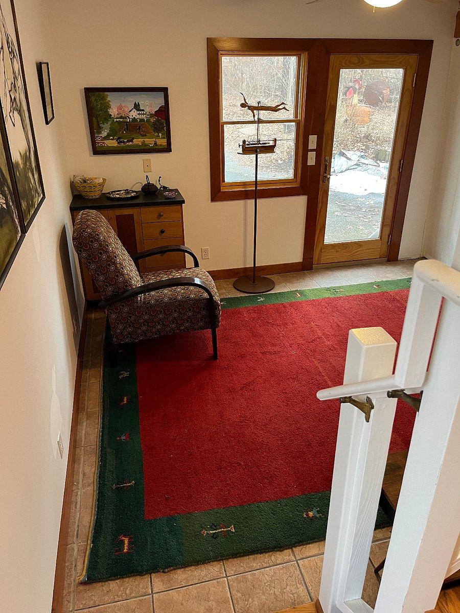 Walking down the steps from living space to your door and parking space beyond.