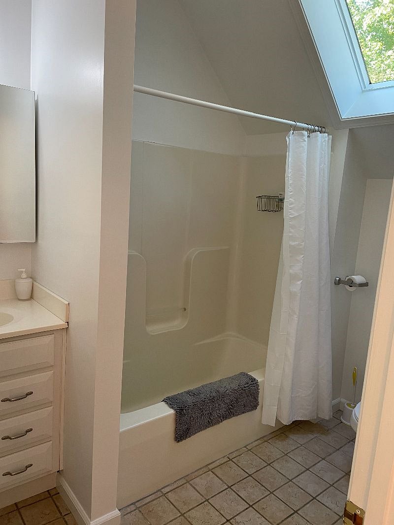 Full tub and shower.