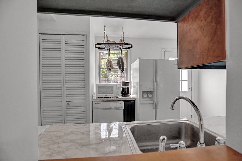 Washer and dryer behind bifold door