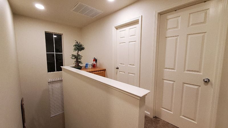 NEWER CARPET UPSTAIRS KEEPS IT QUIET ALONG WITH DUAL PANED WINDOWS