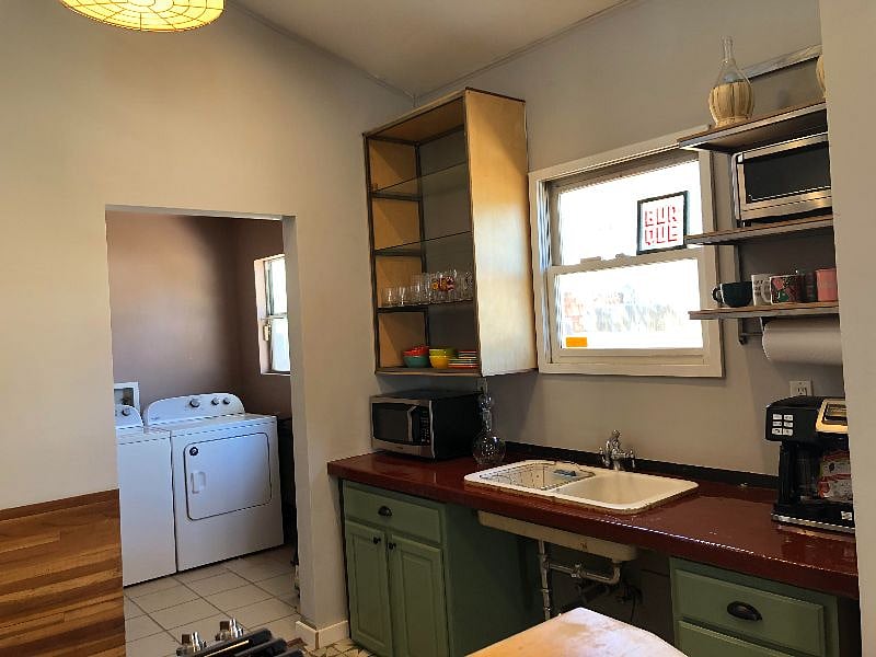 Kitchen with View into Laundry