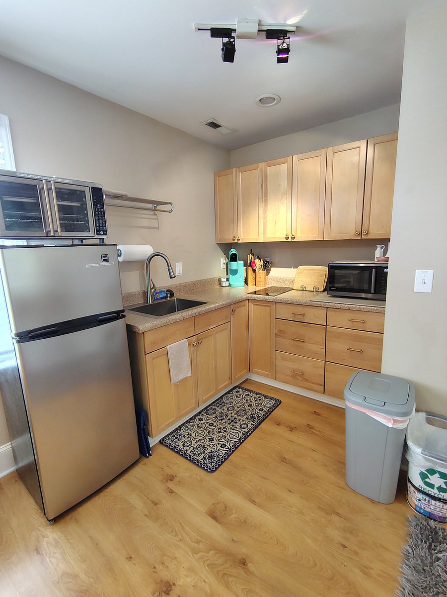 kitchen has apt sized fridge and freezer, microwave, counter top oven/air fryer, k-cup coffee maker, etc