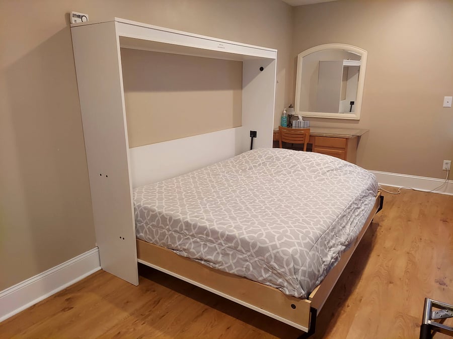 queen sized murphy bed with new mattress and tempurpedic topper